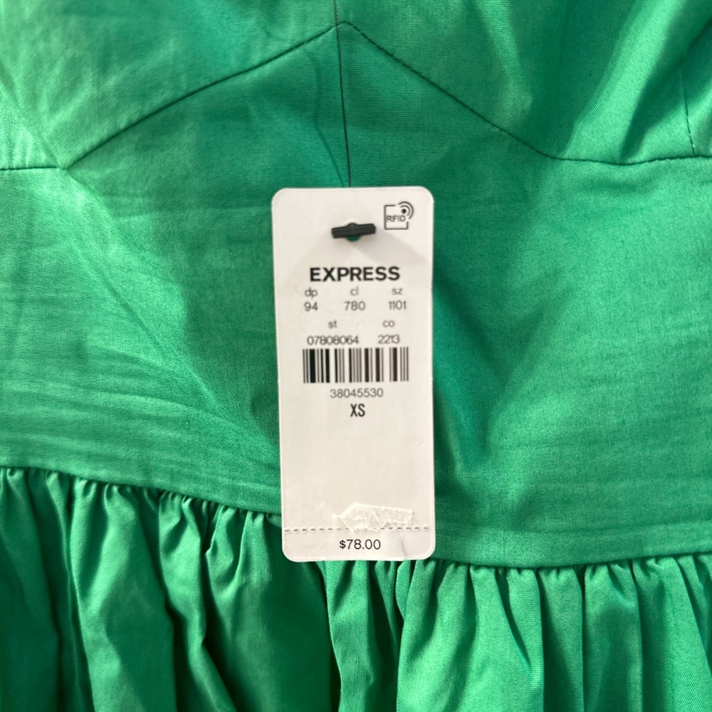 Express spaghetti strap short dress with pockets.  Size XS.